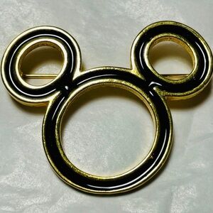 Mickey Mouse gold toned and black paint brooch or pin rings